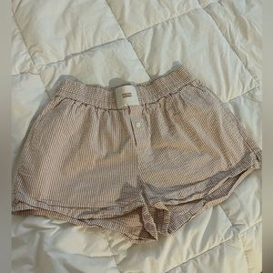 Kith Striped Tan and White Athletic Shorts